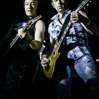Neil and Alan playing guitar.